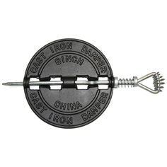 a metal pin with the words cast iron danger on it and two screws attached to it