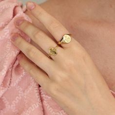 BIRTH ∙ FLOWER ∙ R I N G D E T A I L S A classic oval ring with your favorite birth flower.   * Material: Sterling Silver, 14K Gold Filled , 14K Rose Gold Filled or 14K solid gold  (Gold Filled is made of thick 14k gold or rose gold layered on .925 sterling silver.) REGULAR OVAL RING * Oval size: 8 x 10mm * Band width: 2mm PETITE SIGNET RING * Oval size: 5x7mm * Band width: 2.5mm STANDARD SIGNET RING * Oval size: 8x10mm * Band width: 2.5mm PERSONALIZATION: Enter flowers in order from left to right Maximum: 4 flowers Happy Shopping! From CodeBlue Jewelry with love Ring Flower, Oval Ring, Oval Rings, Ring Oval, Flower Jewelry, Birth Flower, Birth Flowers, Flower Ring, Flower Jewellery