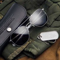 Embrace timeless style and military-grade durability with the Military Special Edition Aviator Sunglasses by Randolph Engineering. These authentic Randolph Aviators have been trusted by U.S. military pilots for over 40 years, making them the ultimate choice for those who value quality and precision. Each pair in this Special Edition Collection includes a custom military-issued embossed case, a Randolph dog tag keychain, and a military-inspired cleaning cloth. Choose from Matte Chrome, 23k Gold, Randolph Sunglasses, Randolph Engineering, Pilot Sunglasses, Sports Sunglasses, Prescription Sunglasses, Dog Tag, Sunglasses Shop, Pilots, Aviator Sunglasses