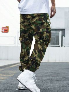 Details:Patched \nDetails:Pocket \nClosure Type:Drawstring Waist \nColor:Grey \nPattern Type:Letter \nPattern Type:Camo \nType:Cargo Pants \nWaist Line:Natural \nLength:Long \nFit Type:Loose \nFabric:Slight Stretch \nMaterial:Woven Fabric \nComposition:100% Polyester \nCare Instructions:Machine wash or professional dry clean \nPockets:Yes \nBody:Yes \nSheer:No \n Utility Cargo Pants, Pocket Cargo Pants, Teen Boy, Camo Print, Spring And Fall, Army Green, Cargo Pants, Drawstring Waist, Woven Fabric