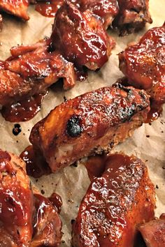 barbecued meat on parchment paper with sauce