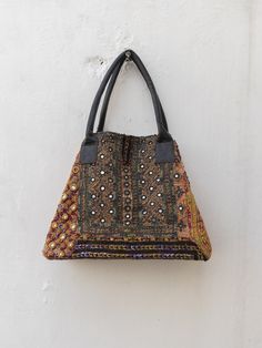 buy any two bags and get 45% discount.  use code : BAG45 Handmade kantha bag  ( free shipping ) customs order accept one of a kind .(Handmade banjara bag) Our vintage banjara bags are a perfect combination of style and practicality. Each bag is made from upcycled vintage Indian saris then hand stitched in the homes of North Indian artisan women. Each piece, unique as the hands that lovingly stitched it, tells a story. No two piece are alike, this is the beauty of these pieces. Colorful patterns, Kantha Bag, 31 Bag, Vintage Style Bag, Indian Saris, Colorful Patterns, Cotton Gifts, Indian Sari, Vintage Bag, Vintage Indian