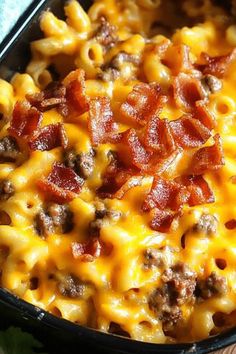 a casserole dish with cheese and bacon in it