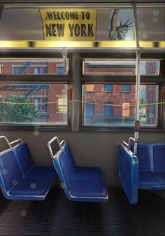 two blue seats sitting next to each other in front of a window on a train