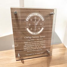 a glass plaque with an image of a medical symbol and the words cmspt sunny james on it