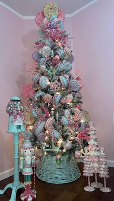 a christmas tree decorated with lollipops and candy