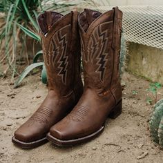 Enjoy that country feel in these classically rugged, casual western boots for men. As an everyday boot, it sports brown distressed leather underneath traditional Western stitching on the front. Inlays on the shaft add and a narrow square toe adds that final country touch, while genuine leather throughout, a cushioned insole and leather lining ensure you're comfortable wearing these country boots all day. And don't worry about wearing them out; Goodyear welt construction means they're built to la Rustic Moc Toe Moto Boots For Ranch, Rustic Moto Boots With Moc Toe For Ranch, Rugged Snip Toe Moto Boots For Ranch, Western Moto Boots With Goodyear Welt For Rodeo, Rugged Moto Boots With Snip Toe For Ranch, Rugged Moto Boots With Moc Toe For Rodeo, Rugged Snip Toe Moto Boots For Western-themed Events, Country Style Boots With Reinforced Toe For Western Events, Rugged Distressed Brown Boots For Western-themed Events