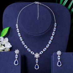 Blue Crystal Jewelry Sets For Wedding, Elegant Blue Bridal Sets Gift, Royal Blue Crystal Jewelry For Party, Blue Jewelry Sets For Wedding, Blue Dangle Necklaces For Wedding, Blue Cubic Zirconia Jewelry With Matching Earrings, Blue Crystal Jewelry With Matching Earrings, Blue Hand Set Jewelry For Wedding, Hand Set Blue Jewelry Sets For Wedding