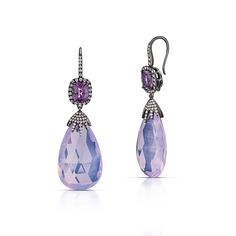 These lovely 18 karat white gold with black rhodium drop earrings feature lavender moon quartz briolettes weighing 53.09 total carats, cushion cut lavender spinel weighing 3.85 total carats, and over 100 round brilliant cut diamonds with a total weight of 0.79 carats. The diamond and lavender quartz drops can be removed from the top of the earrings so the spinel and diamond halos can be worn by themselves. Reference Code: 32657Shop other beautiful pieces in our Earring Collection.For inquiries o Elegant Lavender Evening Jewelry, Elegant Lavender Jewelry For Evening, Elegant Lavender Earrings With Gemstone Accents, Moon Quartz, Lavender Moon, Lavender Quartz, Earring Collection, Black Rhodium, Round Brilliant Cut Diamond