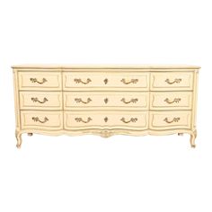 a white dresser with drawers and handles on it's sides, against a white background