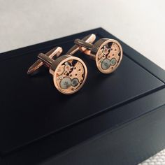 Elevate your formalwear with these unique cufflinks featuring real Omega movements, embodying a distinctive steampunk aesthetic. Crafted as a one-of-a-kind steampunk gift for men, these vintage real watch cuff links blend retro metal mechanical charm with modern sophistication. Each pair showcases non-working watches, meticulously upcycled into stylish accessories that reflect craftsmanship and creativity. Ideal for those who appreciate the art of upcycling and the elegance of vintage mechanical Rose Gold Watch Accessories With Skeleton Dial As Gift, Metal Round Watch Accessories For Gift, Elegant Watch Accessories With Subdials For Gifts, Formal Round Jewelry With Skeleton Dial, Steampunk Round Jewelry For Formal Occasions, Steampunk Style Round Jewelry For Formal Occasions, Round Rose Gold Watch Accessories As Gift, Classic Metal Watch Accessories For Formal Occasions, Skeleton Dial Metal Jewelry As A Gift