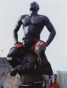 two black men standing next to each other