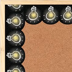 a cork board with light bulbs on it