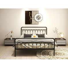 a bedroom with a metal bed frame and nightstands