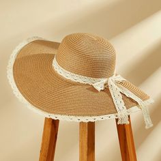 Beat the heat in style with this fashionable straw sun hat. The extra-wide brim provides ample shade and UV protection for your face and neck. The lace trim detail adds a touch of elegance. Lightweight and breathable, it's perfect for sunny days at the beach, outdoor events, or vacations. The durable straw construction ensures lasting quality. Product code: CAC03C4E004HC Cheap Bohemian Wide Brim Hats, Beach Hat Casual, Vintage Hats Beach, Oversized Sun Hats, Round Hat With Brim, White Dress With Felt Hat, High Priestess Hat, Wide Brim Floppy Sun Hat, Cheap Short Brim Straw Hat For Ranch