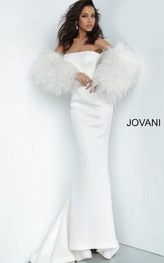 White Strapless Fur Sleeves Jovani Gown 1226 Style Code: 1226 Available Colors: black, blush, white, white/black Colors: Available Sizes: 00 - 24 Buy it Now Closure: Invisible Back Zipper with Hook and Eye Closure. Details: Stretch scuba fabric, form fitting silhouette, floor length with train, strapless bodice, straight neckline, ostrich feather sleeves. Feather Sleeves, Jovani Gown, Jovani Prom, Dazzling Dress, Black Blush, Prom Dresses Jovani, Sleeve Ideas, Trumpet Dress, Evening Dresses With Sleeves