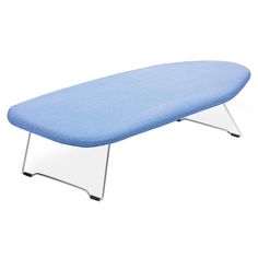 a blue ironing board sitting on top of a metal frame bench with clear legs