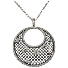 This spectacular pendant necklace features 140 round brilliant cut diamonds set in beautifully detailed 18K white gold.  Approximate total diamond weight:  1.50 ct.  Diamond color: H-I  Diamond clarity: SI1  Size:  16.5 inches (necklace)  48 mm x 39 mm (pendant)  Weight:  9.7 dwt. /  15.2 gr.  Stamped: 3142  AL  750  Very good condition, professionally polished.  Will come packaged in a gift box or pouch (when possible) and will be shipped U.S. Priority Mail Insured. Exquisite Diamond Round Pendant Necklace, Exquisite Round Diamond Pendant Necklace, Exquisite Round Pendant Diamond Necklace, Exquisite Diamond Necklace With Round Pendant, Dazzling Platinum Diamond Necklace With Pave Setting, Luxury Round Diamond Necklace With Rose Cut Diamonds, Luxury Rose Cut Diamond Necklace In Platinum, Luxury Diamond White Necklace With Rose Cut Diamonds, Luxury Platinum Necklace With Rose Cut Diamonds