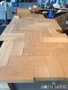 a wooden table with several pieces of wood on it