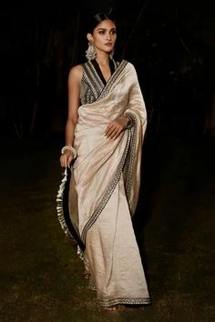 Shop for Matsya Beige Tissue The Grand Athena Saree With Blouse for Women Online at Aza Fashions Classy Saree Look, Victorian Elements, Traditional Blouses, Embroidery Zardozi, Zardozi Embroidery, Black Sleeves, Black Sleeveless Blouse, Beige Outfit, Indian Dresses Traditional