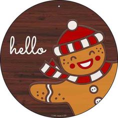 a round wooden sign with a smiling ginger on it's face and the word hello written in white