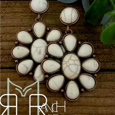 White Buffalo Turquoise Earrings Abilene White Bufflo Earrings The Perfect Pair Of Earrings To Complement Any Outfit Choice. No Matter If You’re Hanging Around The Home Place Or Headed Out For A Night On The Town These Accent Earrings Are Sure To Be A Show Stopper. Each Pair Of Earrings Is Beautifully Unique And Natural In Coloring. No Two Will Ever Be Alike! *Please Refer To Size In Listing Photos (2.1 Inches By 1.3 Inches) *Silver Plated Alloy- Lead And Nickel Free *Faux Stone Elements Turquoi Southwestern White Dangle Jewelry, Southwestern Style White Dangle Jewelry, Southwestern White Jewelry Gift, Southwestern Style White Jewelry Gift, White Southwestern Style Jewelry Gift, Southwestern Style White Nickel-free Jewelry, White Teardrop Metal Earrings, Southwestern White Drop Earrings, Southwestern White Teardrop Earrings