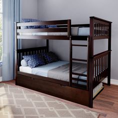 a bunk bed with two sets of drawers underneath it, in a room with hardwood floors and blue curtains