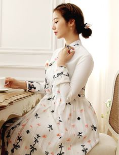 This is a Korean Modern Hanbok Wrap Style Dress for Women. The upper body of the dress is made of lycra blend material for fit and comfort. This hanbok is modernly designed so you can wear it comfortably and beautifully. This modern hanbok is perfect dress for daily and special celebrations such as parties or various events. ⭐You can create a variety of styles by layering skirts of different colors on this dress. Go look Modern Hanbok Skirts: https://www.etsy.com/shop/LunarJogak?ref=seller-platf White High Neck Midi Dress For Spring, White Long Sleeve Ao Dai, White High Neck Stretch Dress, Feminine Fitted High Neck Midi Dress, Fitted White Ao Dai With Stand Collar, White Stretch High Neck Dress, Fitted Long Sleeve Ao Dai For Evening, White Fitted High Neck Midi Dress, Fitted Ao Dai With Long Sleeves For Evening