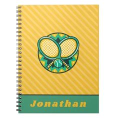 a spiral notebook with a tennis racket and ball on the cover that says jonathan