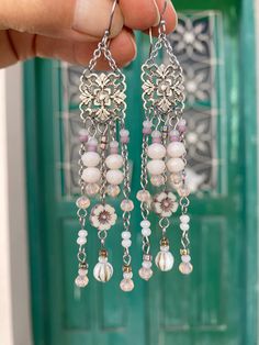 These artisanmade SHOULDER DUSTER EARRINGS 3.5" will caught attention in any occasion you will wear them! Full of details and movement these feminine ear candies are perfect for weddings, bridal showers and any feast where you want to feel like queen. ◾Handmade in sunny Mediterranean island of Cyprus ◾Materials used: Czech glass beads, quality components made of silver plated brass and carefully selected glass beads.Ear wires,chains and all the metal parts (except the charm) are stainless steel, Bohemian Beaded Drop Bridal Earrings, Bohemian Beaded Bridal Drop Earrings, Bohemian Dangle Chandelier Earrings For Parties, Bohemian Chandelier Dangle Earrings For Parties, Bohemian Long Drop Chandelier Earrings For Parties, Bohemian Beaded Bridal Earrings, Bohemian Party Chandelier Dangle Earrings, Bohemian Beaded Chain Dangle Chandelier Earrings, Bohemian Beaded Dangle Earrings For Wedding