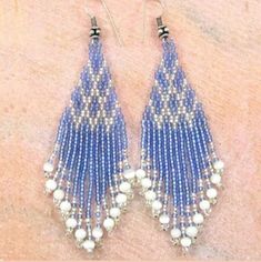 New, Never Worn. Light Blue & White Boho Beaded Dangle Earrings. Please Message Me With Any Questions. Reasonable Offers Accepted. Smoke Free Home. J-2 Bohemian Blue Beaded Earrings With Silver Beads, Blue Silver Beads Drop Earrings, Blue Silver Beaded Drop Earrings, Blue Earrings With Silver Beads, Beaded Feather Earrings, Beaded Feather, Native American Beadwork Patterns, Native American Beadwork, Native American Style