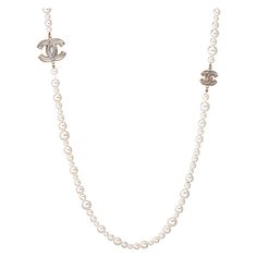 Pre-owned Chanel graduated faux pearl necklace (or belt) crafted in silver tone (circa 2012). The necklace features graduated 6mm to 12mm faux white pearls. Two CC logos separate the beads. The necklace can be worn as a long 48 inch chain or wrapped as a double strand necklace. Also great for wear as a belt. The necklace is in very good condition showing minimal wear. Chanel travel pouch also included. Particulars: Weight: 136.6 grams Size & Measurements: The necklace measures 48 inches in lengt Double Strand Pearl Necklace, Vintage Jewelry Ideas, Chanel Pearl, Chanel Pearls, Graduation Necklace, Chanel Necklace, Random Images, Double Strand Necklace, Pearl Necklaces