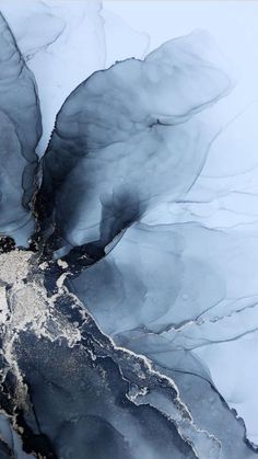 an aerial view of ice and water in the ocean