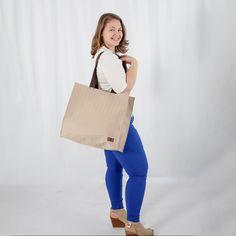 One of our most popular products, this shopper is perfect for almost anywhere you can imagine. This fabric is as robust as it gets. The bag is handcrafted from the excess material reclaimed from a high-end outdoor furniture company. Our customers love it for:- a work tote- a beach bag- a market tote- a mom bag (all the snacks and toys!)- a project bag- a library bag You can't go wrong! The bag features durable double straps that are the perfect length to tuck this bag right under your armBoth st Reusable Shoulder Bag For Shopping, Eco-friendly Shoulder Bag With Canvas Lining For Everyday Use, Reusable Canvas Shoulder Bag For Shopping, Natural Canvas Bag For Everyday Use, Natural Reusable Canvas Bag For Everyday Use, Eco-friendly Canvas Bag With Leather Handles, Eco-friendly Shoulder Bag With Reinforced Handles For Shopping, Natural Bags With Reinforced Handles For Everyday Use, Reusable Canvas Bag In Natural Color