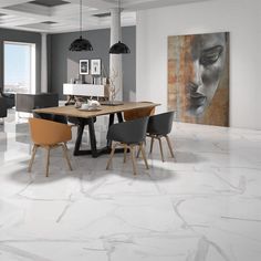 a modern dining room with marble floors and white walls