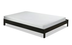 an image of a bed with white sheets and wood frame on the bottom half side