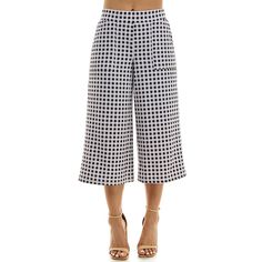 Give your wardrobe a stylish upgrade with this women's Nina Leonard gingham coulotte pants.Click on this WOMEN'S GUIDE to find the perfect fit and more! Give your wardrobe a stylish upgrade with this women's Nina Leonard gingham coulotte pants.Click on this WOMEN'S GUIDE to find the perfect fit and more! FEATURES Elastic waist Soft construction 2 pockets No closure - pull-on stylingFIT & SIZING 21 1/2-in inseam 26 3/4-in leg opening Straight leg opening Midrise sits on the high hip Relaxed fit t Midi Pants, Black And White Gingham, High Hips, Clothing Size Chart, Womens Clothing Sizes, Bottom Clothes, Cropped Pants, Bottoms Pants, Trousers Women