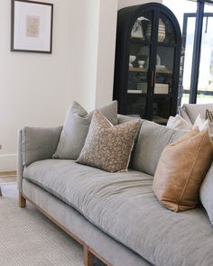 a living room filled with lots of furniture