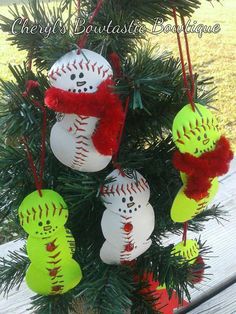 christmas ornament ornaments hanging from a tree with snowmen and mittens on them