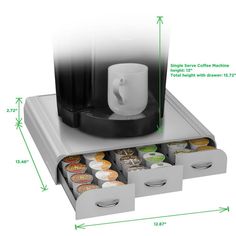 a coffee maker with six cups in it and measurements for the cup holder on top