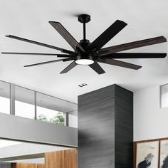 a modern ceiling fan in a living room