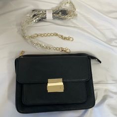 *New Without Tag* Forever 21 Black Purse Gold Shoulder Strap Crossbody Shoulder Bag With Gold Tone Front Lock Approx Measurements: 9" X 7" Color: Black Always A Smoke And Pet Free Home Black Rectangular Shoulder Bag For Day Out, Trendy Forever 21 Shoulder Bag With Adjustable Strap, Trendy Rectangular Forever 21 Bags, Versatile Black Shoulder Bag For Night Out, Versatile Black Shoulder Bag For Day Out, Elegant Black Bags For Day Out, Elegant Black Bag For Day Out, Forever 21 Shoulder Bag With Adjustable Strap, Trendy Forever 21 Crossbody Shoulder Bag