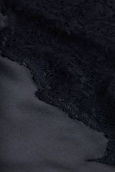 An artful mix of silk and lace makes our black Bryna cami intriguing to the eye and luxurious against the skin.• 100% silk charmeuse with floral lace inset• Deep V-neckline• Relaxed fit• Adjustable straps• Scalloped hem• No closures | L'AGENCE Bryna Silk Lace Camisole In Black Erin Walsh, Silk And Lace, Rebecca Vallance, Cami Nyc, Knit Denim, Black Camisole, Silk Lace, Lace Camisole, Black Camis