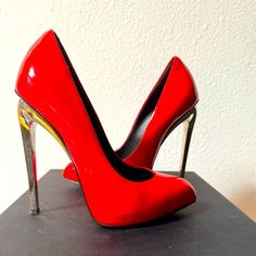 Worn Only Once. In Excellent Condition Modern Red Heels With 4-inch Heel, Bold Evening Heels With Sculpted Heel, Bold Evening Heels With Wrapped Heel, Red Party Court Shoes With Reinforced Heel, Red High Heel Court Shoes With Reinforced Heel, Red Court Shoes With Branded Heel For Parties, Red High Heels With Reinforced Heel, Red Patent Leather Court Shoes For Party, Bold Patent Leather Heels For Formal Occasions