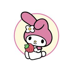 hello kitty holding a strawberry in her hand