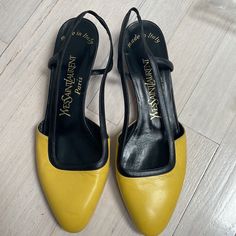 Yves St. Laurent Yellow And Black Kitten Heels Vintage Leather Slingback One Small Scuff On The Left Toe Area- Pictured. Great Condition, Minimal Wear On Sole. Yellow Open Toe Slingback Pumps For Evening, Yellow Ankle Strap Slingback Pumps For Evening, Yellow Slingback Pumps With Heel Strap For Evening, Yellow Slingback Pumps For Evening, Yellow Leather Slingback Pumps For Evening, Yellow Low Heel Evening Heels, Yellow Pointed Toe Slingback Pumps For Evening, Yellow Leather Slingback Pumps With Pointed Toe, Luxury Black Kitten Heels With Heel Loop