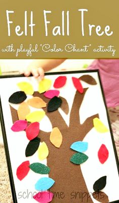 the fall tree is made with felt and colored paper