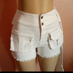 Nwot White Denim Shorts - Wide Waistband - 2-Front Raw Pockets - Tie Like Sleeves - Raw Hem - Very Unique - Closure: 2-Buttons And Zipper Fabric: 95% Polyester; 5% Spandex In Excellent Condition Smoke And Pet Free Environment - White High Waist Jean Shorts With Belt Loops, White Cotton Jean Shorts With Belt Loops, Casual White Jean Shorts With Belt Loops, White Fitted Jean Shorts With Pockets, Fitted Cotton Jean Shorts For Day Out, Trendy White Shorts With Belt Loops, Stretch Cotton Shorts With Belt Loops, White Fitted Jean Shorts For Day Out, Fitted White Jean Shorts For Day Out