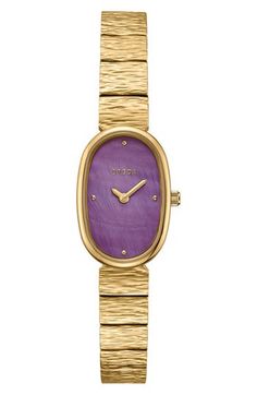 Wrap your wrist in this slender and elegant timepiece which catches the eye with its mother-of-pearl dial, smooth case and textured link bracelet. 18mm case; 10mm band width Deployant clasp closure Quartz movement Mineral crystal face Mother-of-pearl dial Stainless steel or stainless steel with 14k-gold plate Imported Modern Purple Watch With Round Dial, Luxury Purple Watch For Formal Occasions, Luxury Purple Watches For Formal Occasions, Unisex Jewelry, Minerals Crystals, Purple Gold, The Eye, Quartz Movement, Link Bracelets