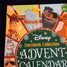 the storybook collection adventure calendar is on display at disney's art of animation